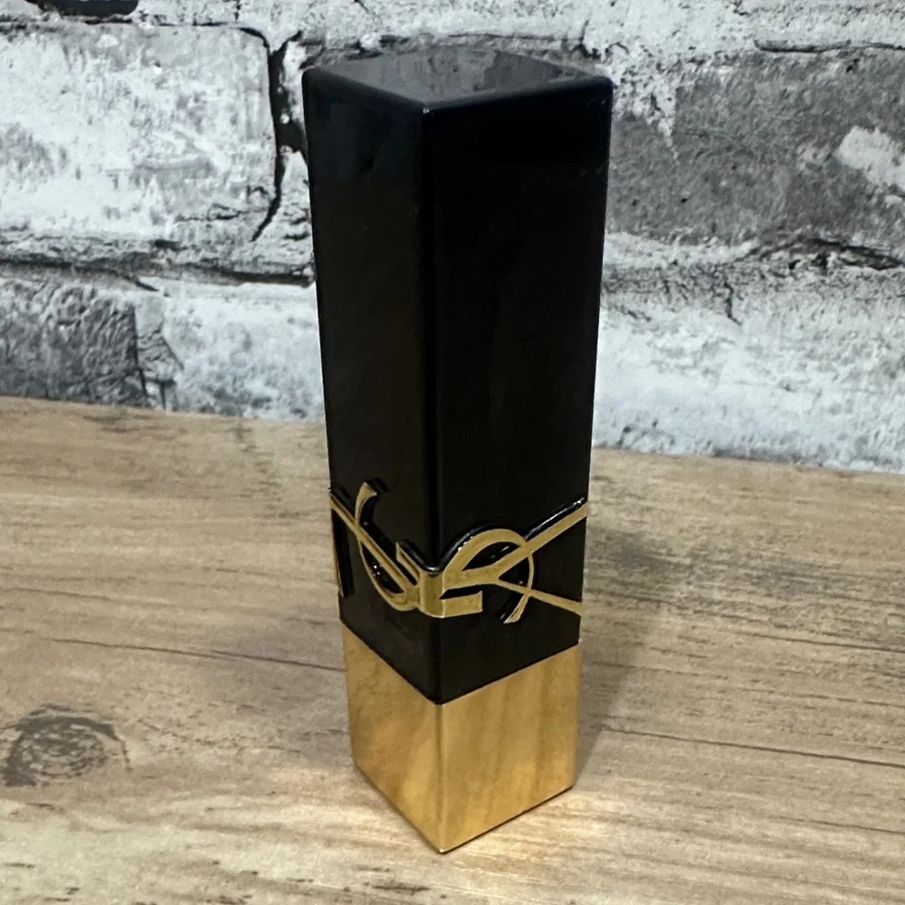 EUC Yves Saint Laurent Black and Gold Lipstick